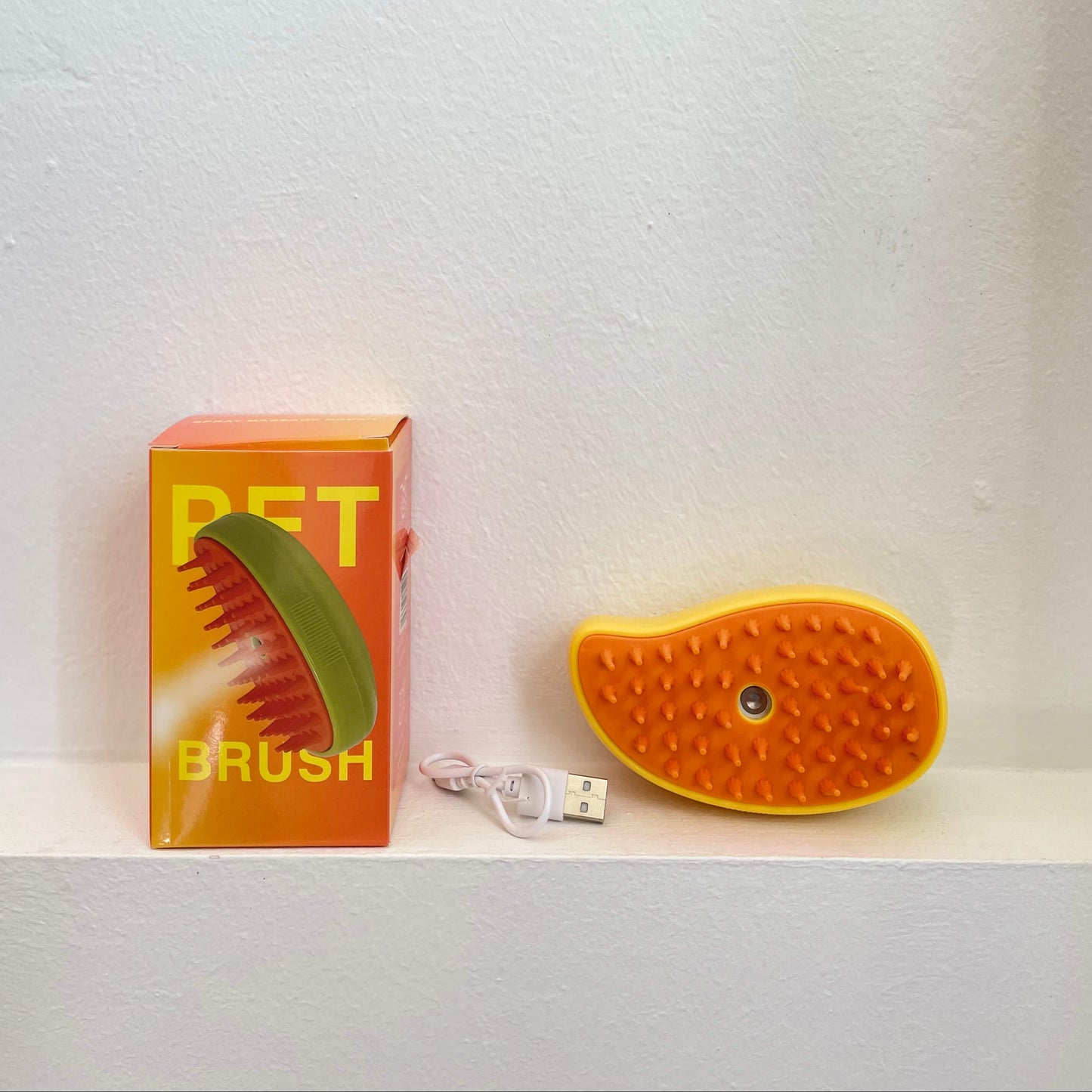 Cepillo vaporizador mascotas